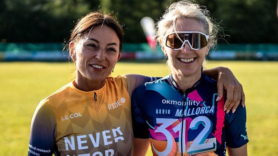 Juliet with a fellow rider at a cycling event